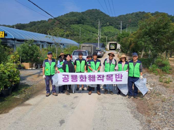 ‘2025 아이언맨 70.3 고성’ 성공 개최 기원 회화면 공룡화훼작목반 클린 고성만들기 환경정비 실시