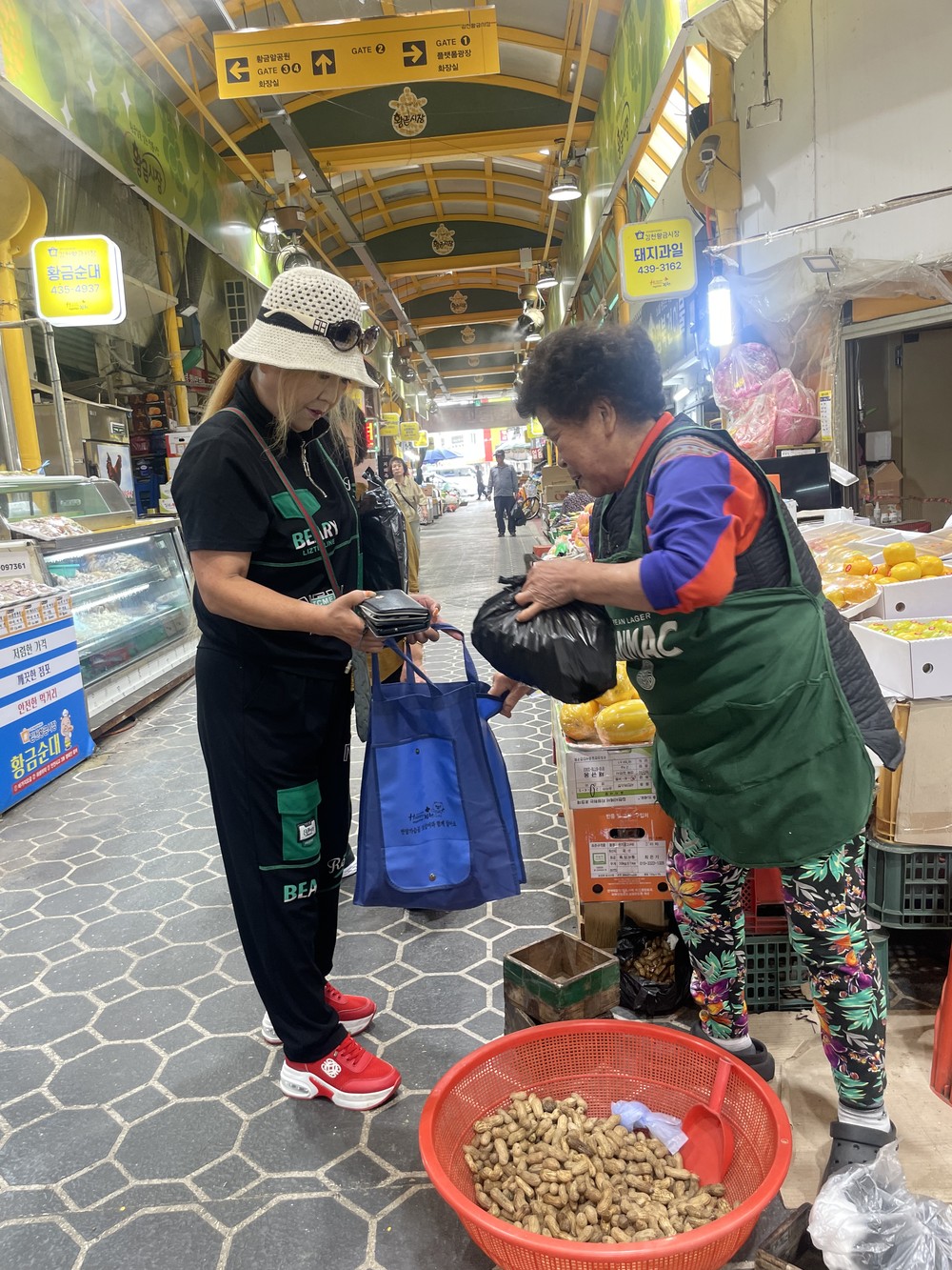 자산동 새마을부녀회, 전통시장 장보기 행사 실시